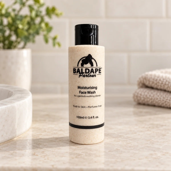 Baldape moisturising beard and face wash bottle on a bathroom vanity.