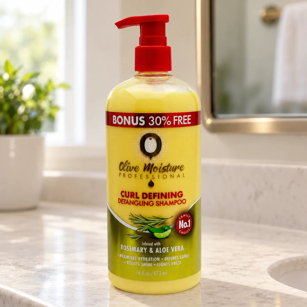 Olive Moisture Curl Defining Detangling Shampoo — 16 oz on a bathroom vanity.