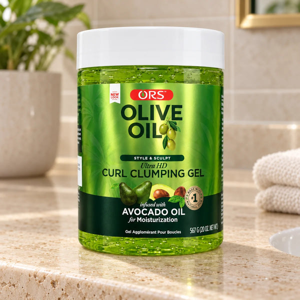 ORS Olive Oil Curl Clumpling Gel with Avocado Oil — 20 oz on a bathroom vanity.