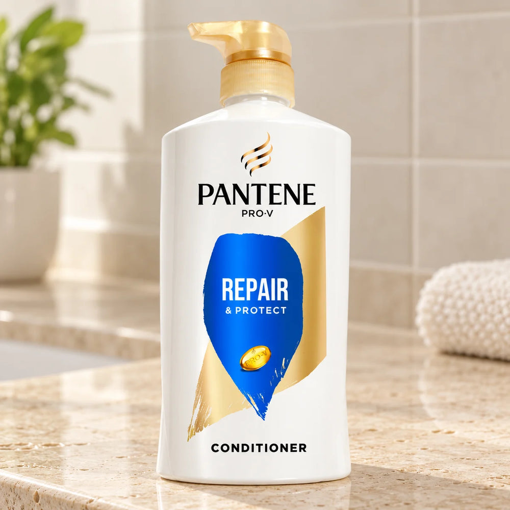 Pantene Pro-V Repair & Protect Conditioner on a bathroom vanity.