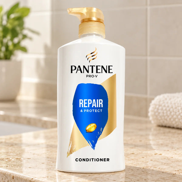 Pantene Pro-V Repair & Protect Conditioner on a bathroom vanity.
