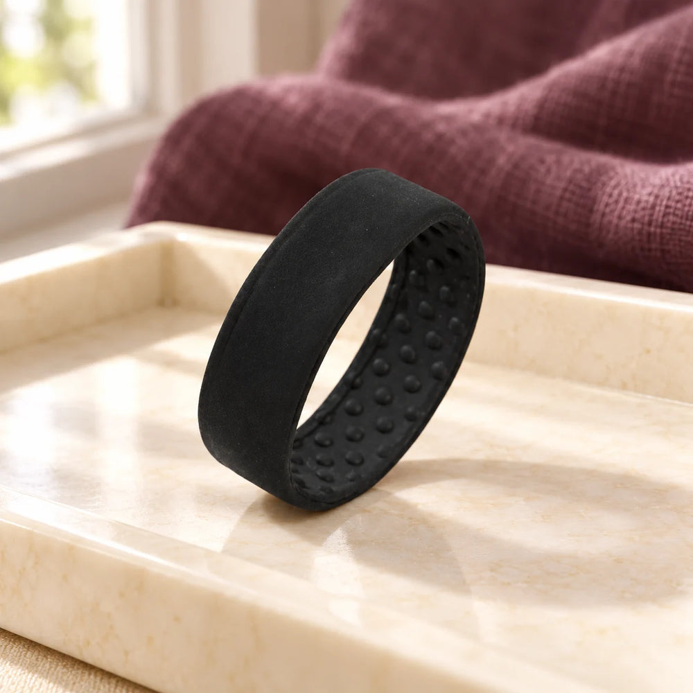 PONY-O Medium Hair Fastener — Black on a dressing-table tray.