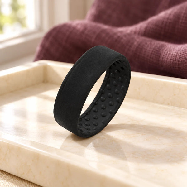 PONY-O Medium Hair Fastener — Black on a dressing-table tray.
