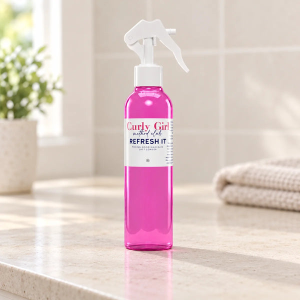Pink 200ml spray bottle on a bathroom vanity.