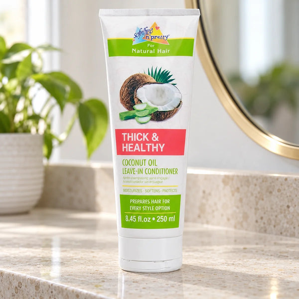 Sof n Free Sofn'free n'pretty Coconut Oil Leave-In Conditioner for Soft, Manageable Kids' Hair — 250 ml on a bathroom vanity.