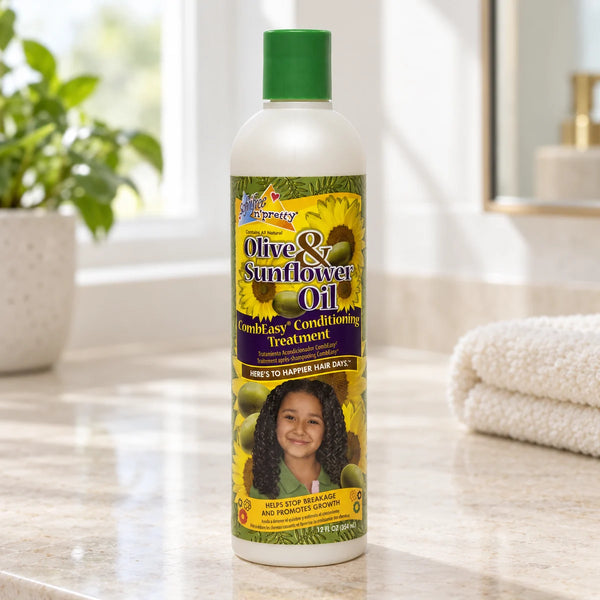 Sof n Free Sofn'Free n'Pretty Olive & Sunflower Oil CombEasy Conditioning Treatment - Detangling & Moisturizing for Kids' Hair — 354 ml on a bathroom vanity or dressing table.