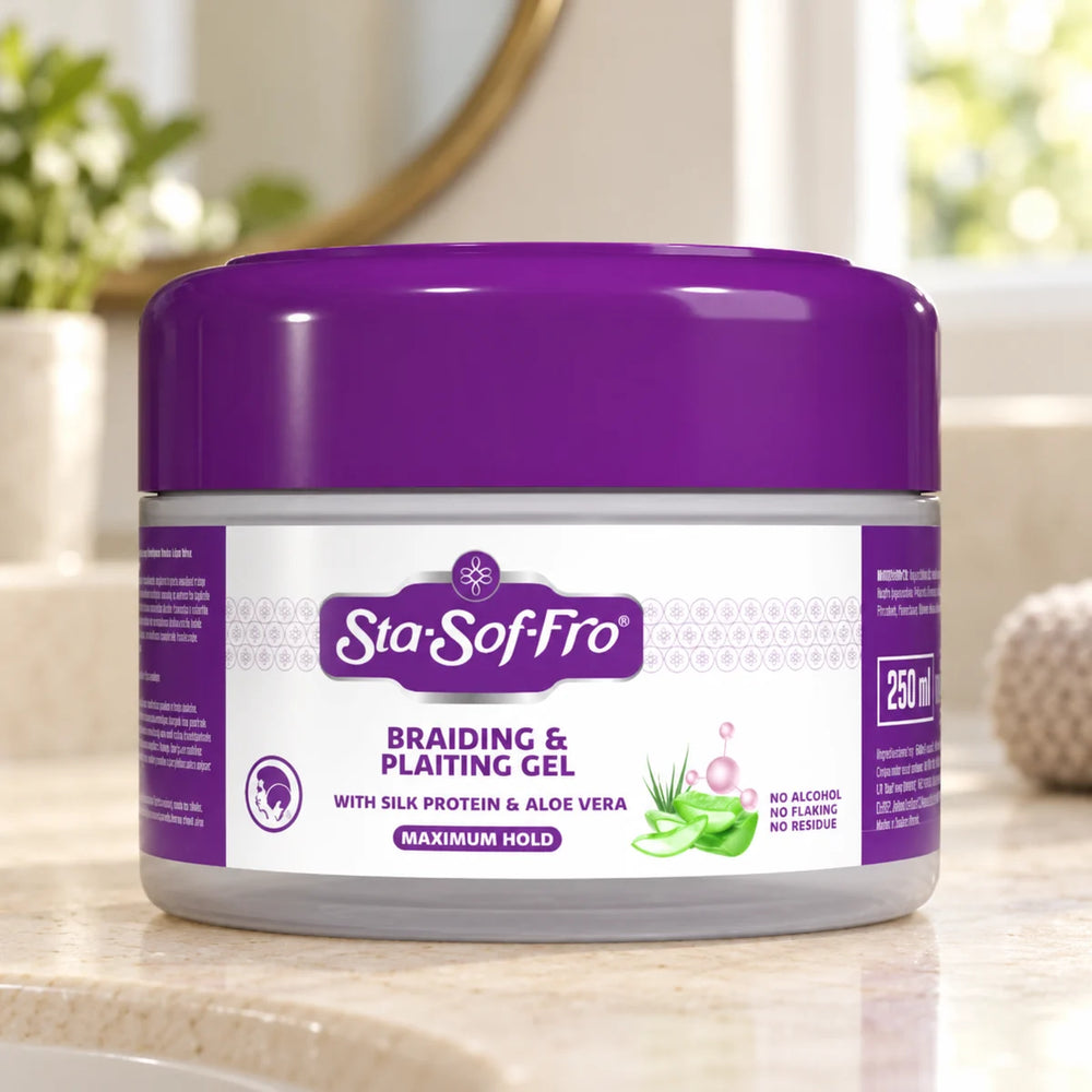 Sta Sof Fro Silk Protein & Aloe Vera Braiding & Plaiting Gel for Frizz-Free, Defined Braids & Twists — 250 ml on a bathroom vanity.