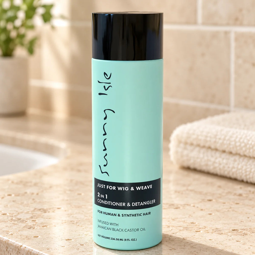 Sunny Isle Just For Wig | 2 in 1 Conditioner & Detangler — 8 oz on a bathroom vanity.
