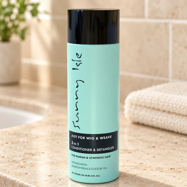 Sunny Isle Just For Wig | 2 in 1 Conditioner & Detangler — 8 oz on a bathroom vanity.