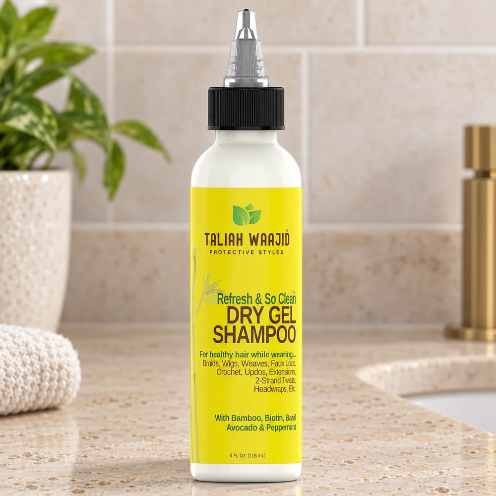 Taliah Waajid Protective Styles Dry Gel Shampoo Instantly — 4 oz on a bathroom vanity.