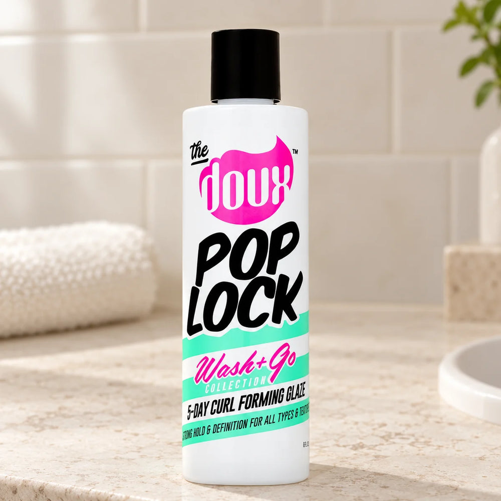 The Doux Pop Lock 5-Day Curl Forming Glaze 8oz Strong Hold Gel — 8 oz on a bathroom vanity.