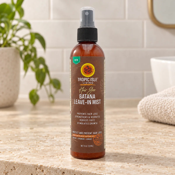 Tropic Isle Living Hair Gro Batana Leave-In Mist — 237 ml on a bathroom vanity.
