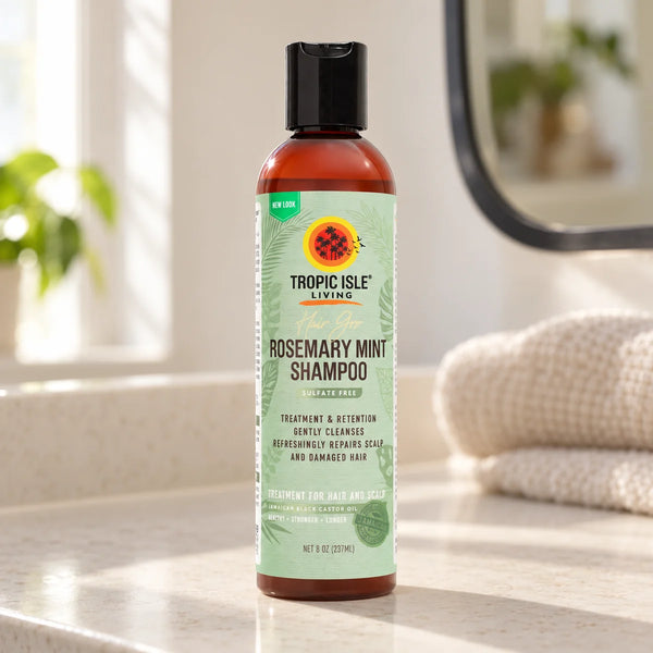 Tropic Isle Living Hair Gro Rosemary Mint Shampoo — 237 ml on a bathroom vanity.